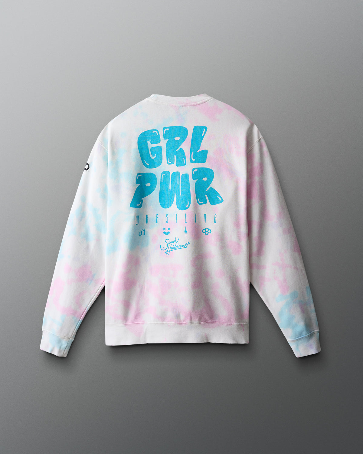 Tie-dye sweatshirt with 'GRL PWR' text on a gray background