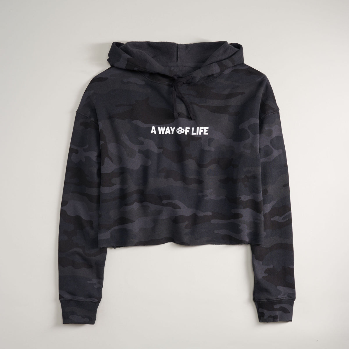 This image showcases a cropped black camouflage hoodie with the text A WAY OF LIFE prominently displayed on the front in white