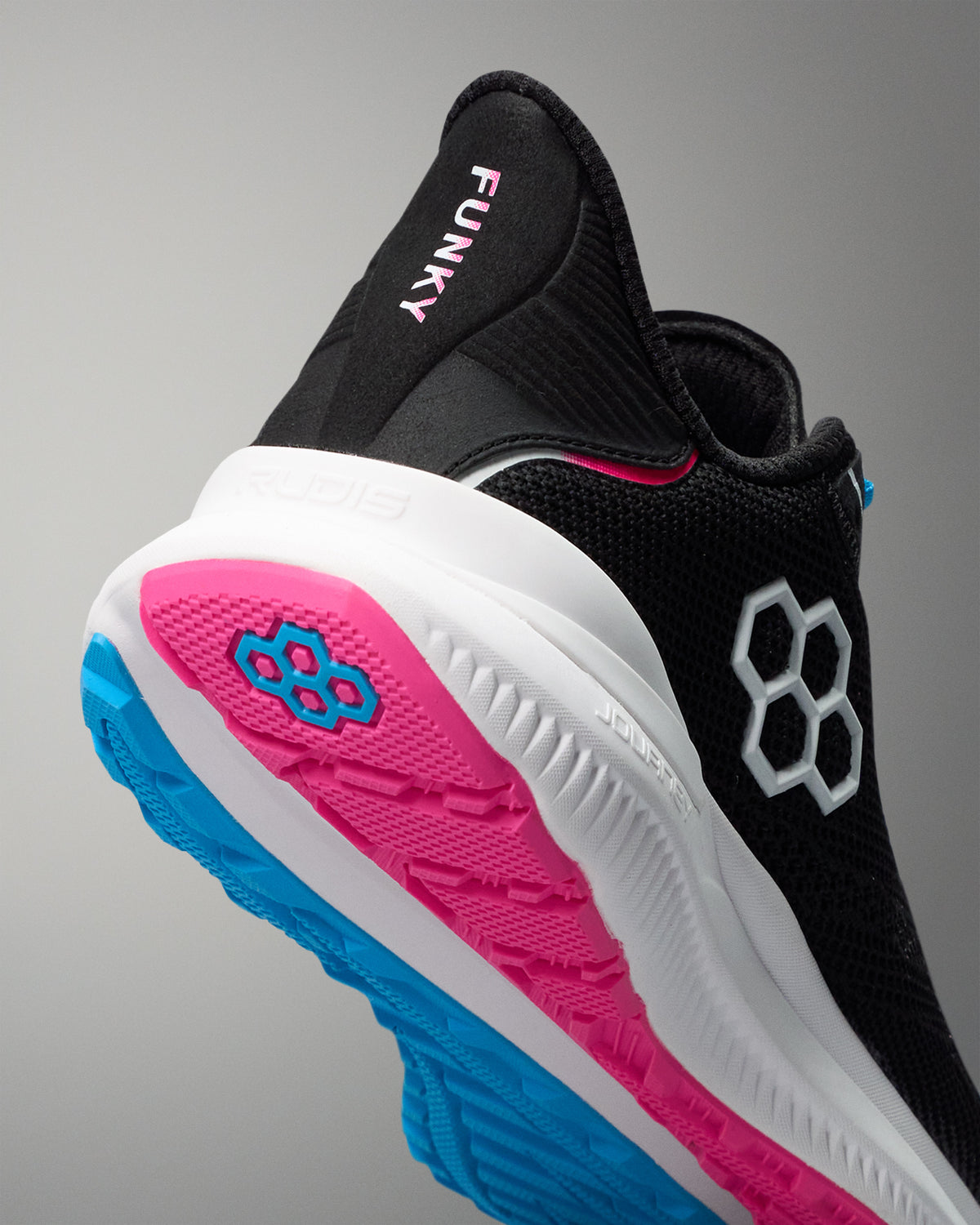 Black, pink, and blue sneaker with 'Funky' branding on a gray background