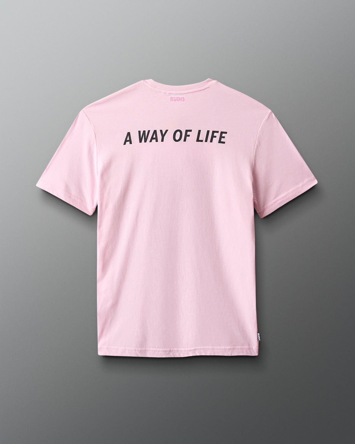 Pink t-shirt with 'A Way of Life' text on the back against a gray background