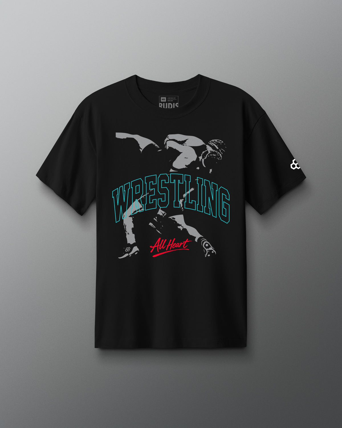 Black t-shirt with wrestling graphic and text on a gray background