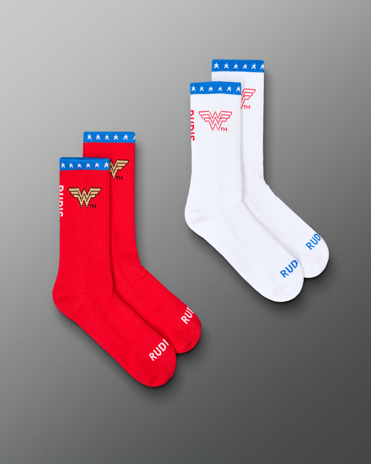 RUDIS Wonder Woman cushioned crew socks 2-pack in red and white, featuring Wonder Woman logos, blue star-patterned cuffs, and RUDIS branding.
Copy Alt Text