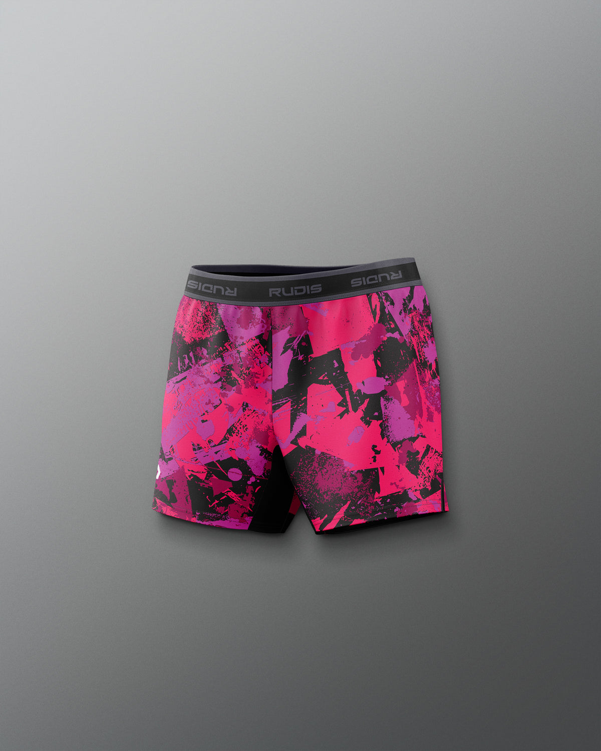 Pink and black patterned shorts on a gray background