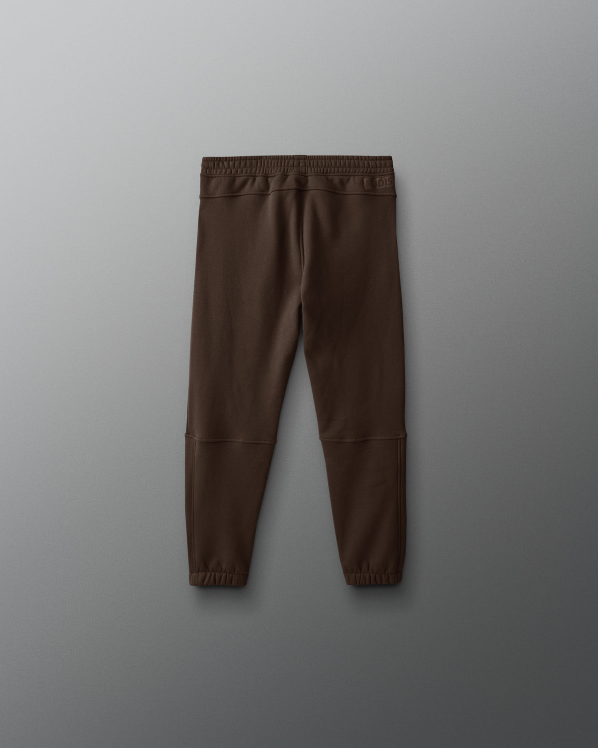 Brown pants on a gray background