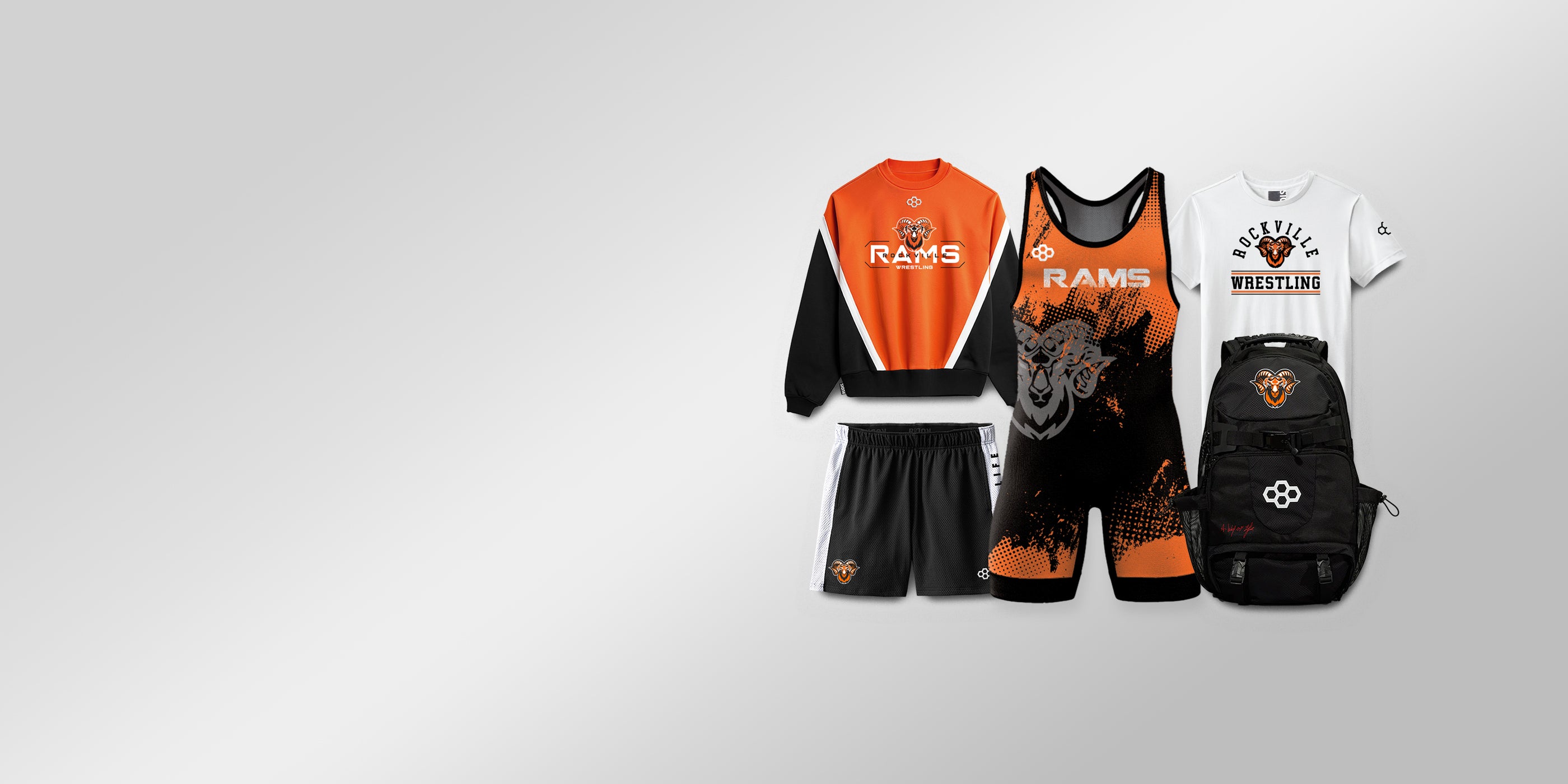 Custom Team Wrestling uniforms with 'RAMS' branding on a gray background