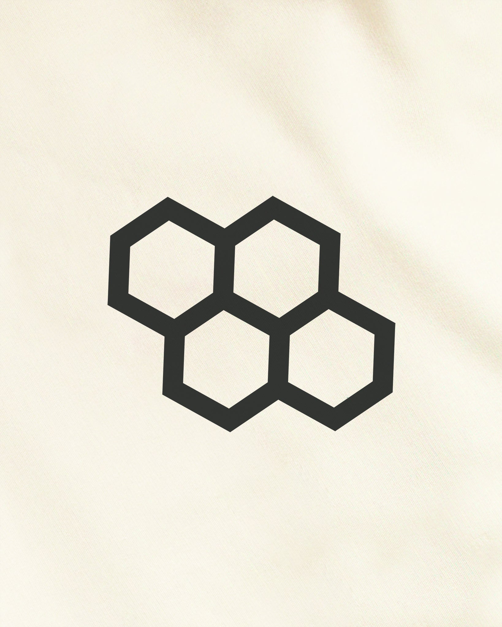 A minimalistic design featuring a cluster of four black hexagons on a light beige background showcasing a modern aesthetic