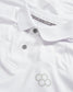 A close-up view of a white polo shirt featuring a sleek design with a subtle logo and contrasting buttons