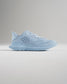 Light blue athletic shoe with a breathable mesh upper and a sleek design ideal for running and casual wear