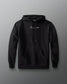 Black hoodie with a brand logo on a gray background