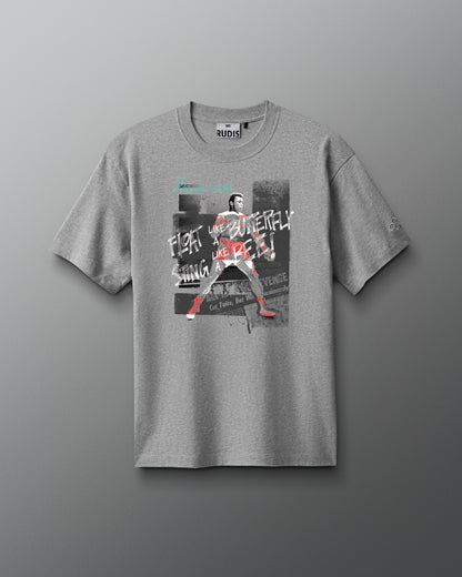 Gray t-shirt with graphic design on a gray background. Muhammad Ali