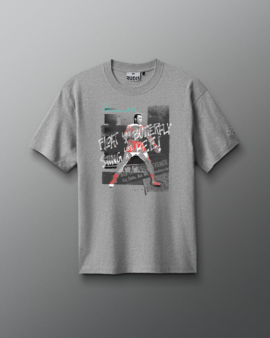 Gray t-shirt with graphic design on a gray background. Muhammad Ali