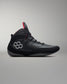 Black wrestling shoe with a unique logo on a gray background - Cary Kolat wrestling shoes