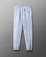 Light blue sweatpants on a gray background