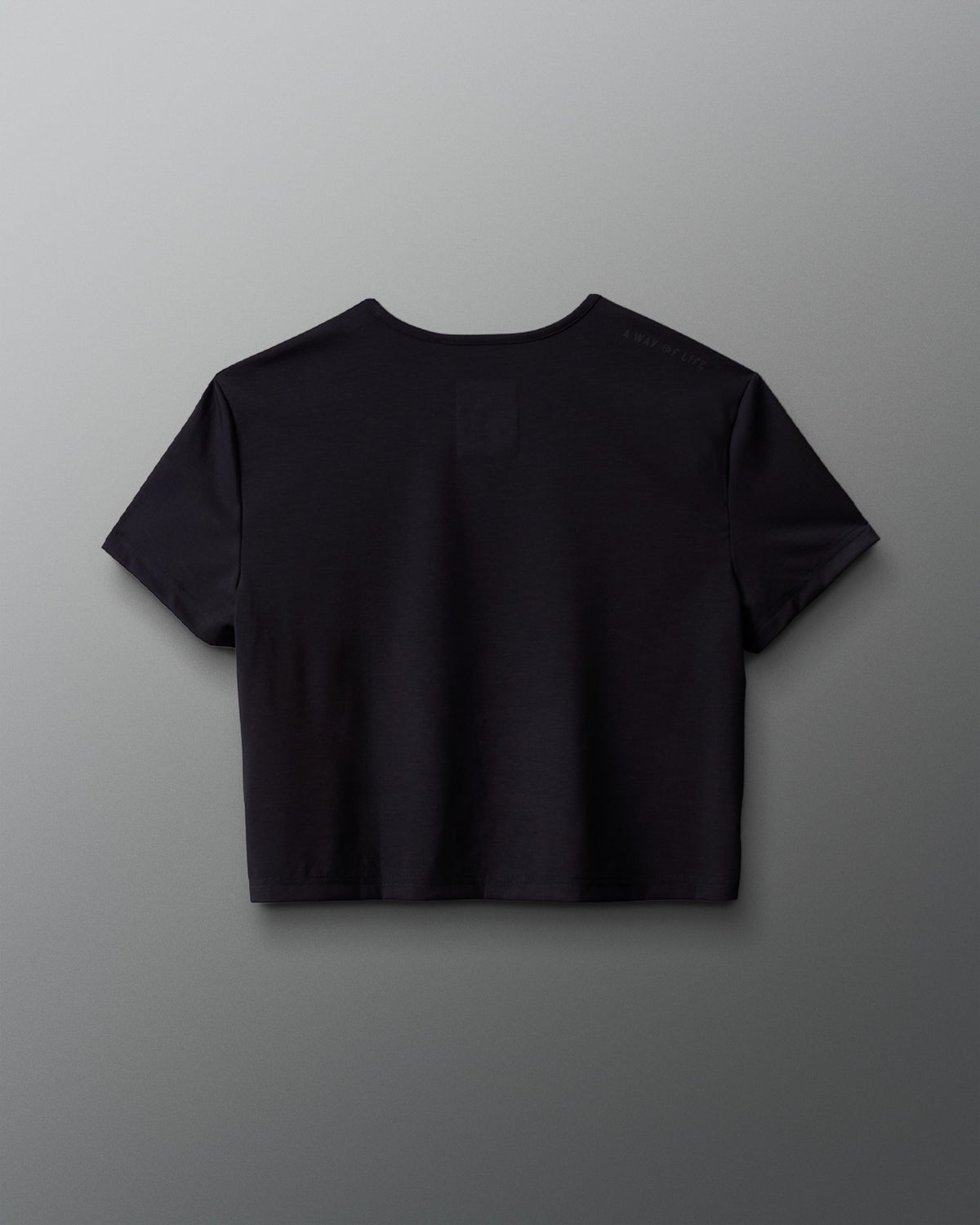 Black t-shirt on a gray background