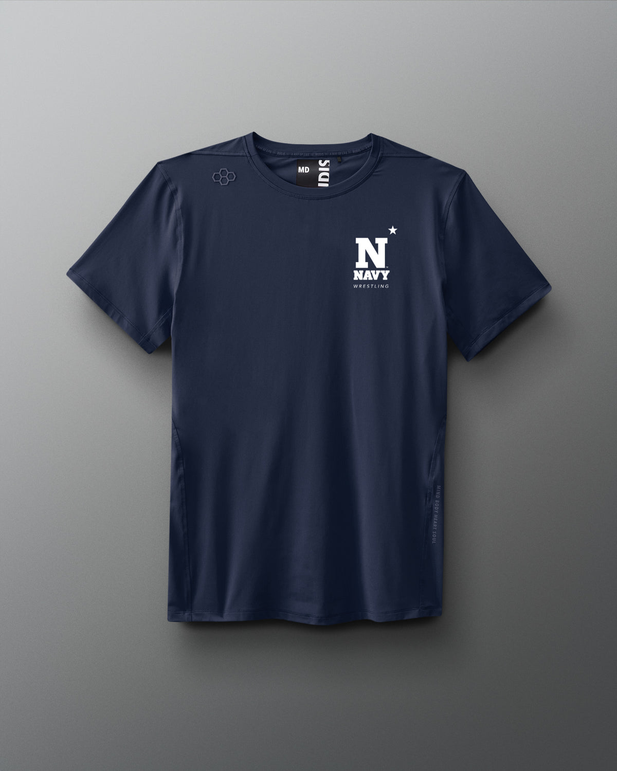 Navy blue t-shirt with a logo on a gray background. Naval Academy