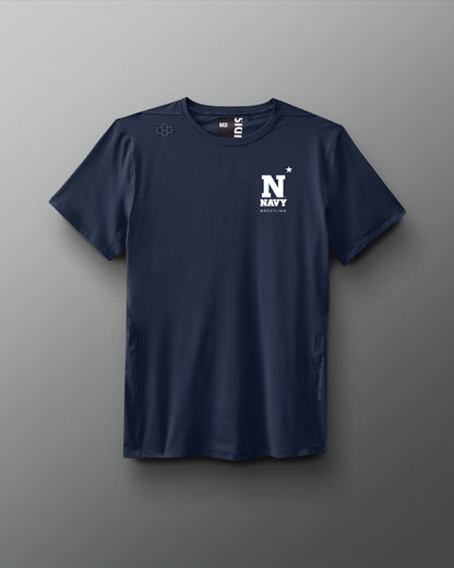 Navy blue t-shirt with a logo on a gray background. Naval Academy