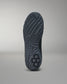 Close-up of a black Jordan Burroughs wrestling shoes bottom sole with tread pattern on a gray background