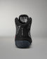 Black Jordan Burroughs wrestling shoes with text and branding on a gray background