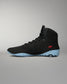 RUDIS JB1 Adult Wrestling Shoe in Dark Shark shown from the medial side, featuring the black high-top construction, tonal JB branding, red RUDIS accent, and light blue outsole.