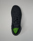 Black Wrestling shoe with a green sole on a gray background