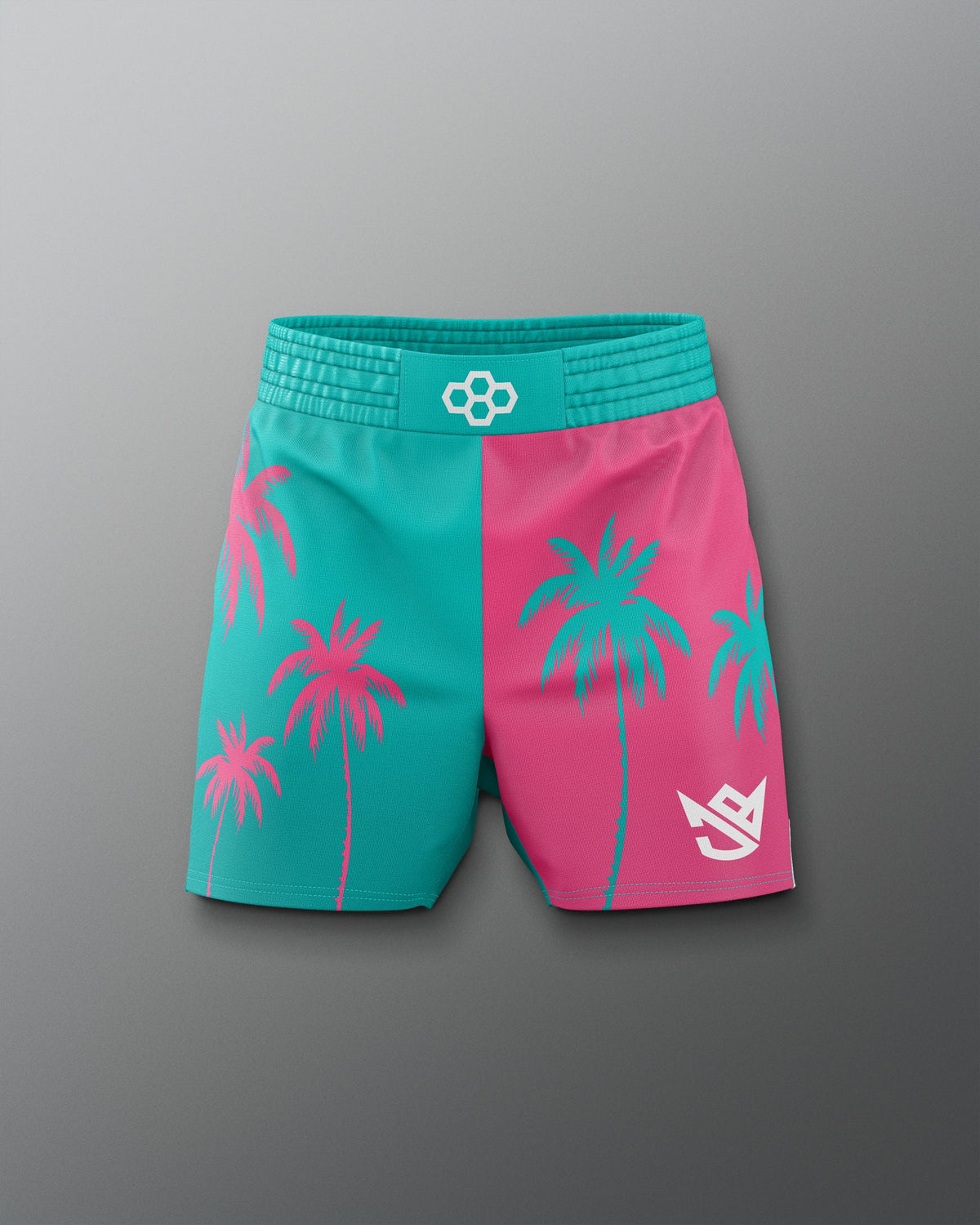 Teal and pink shorts with palm tree design on a gray background