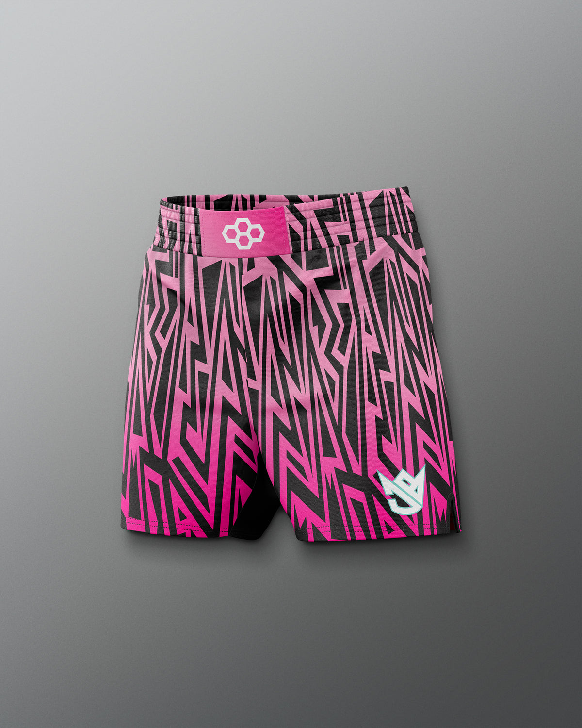 Pink and black patterned shorts with a logo on a gray background