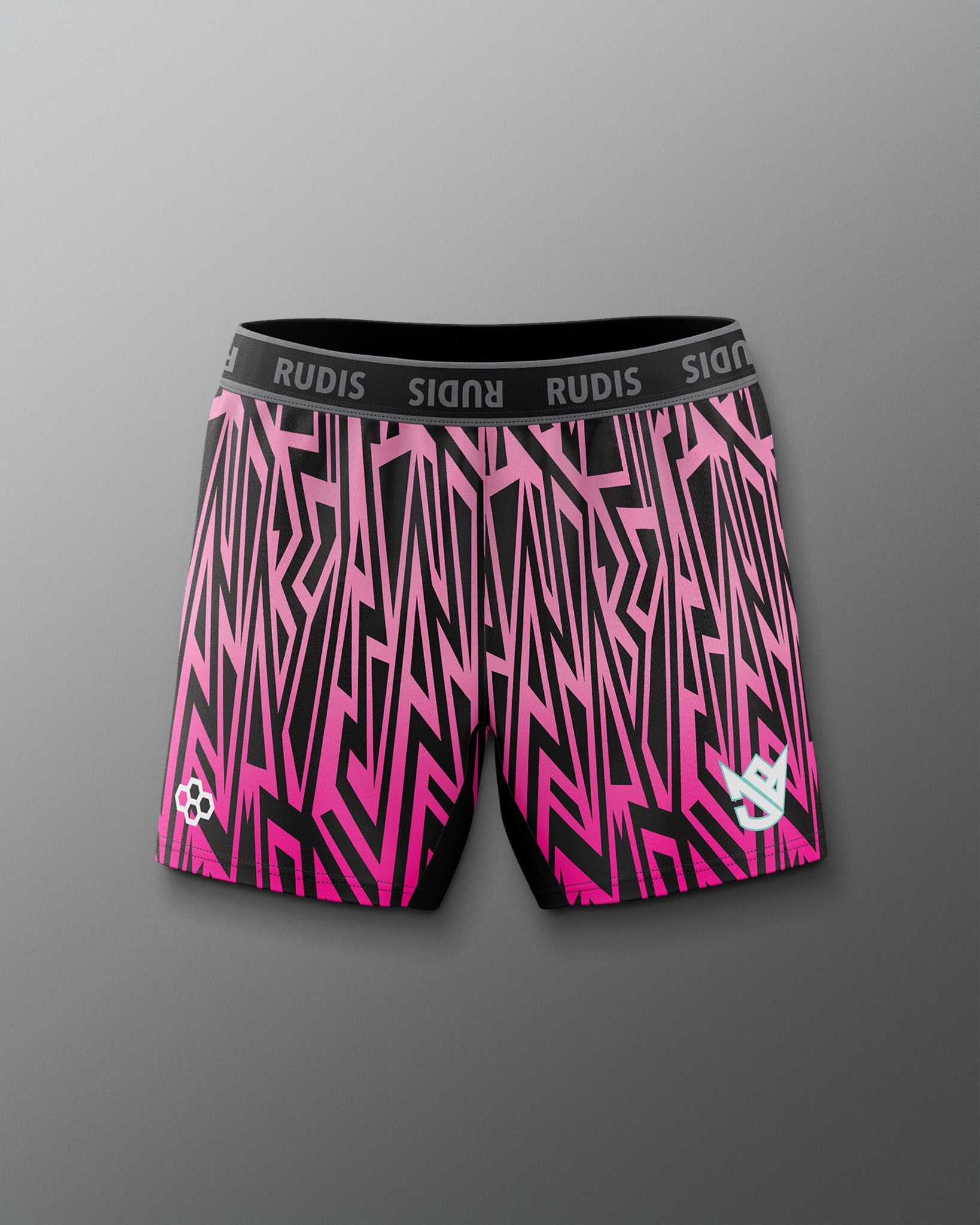 Pink and black patterned shorts with 'RUDIS' branding on a gray background