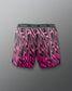 Pink and black patterned shorts with 'RUDIS' branding on a gray background