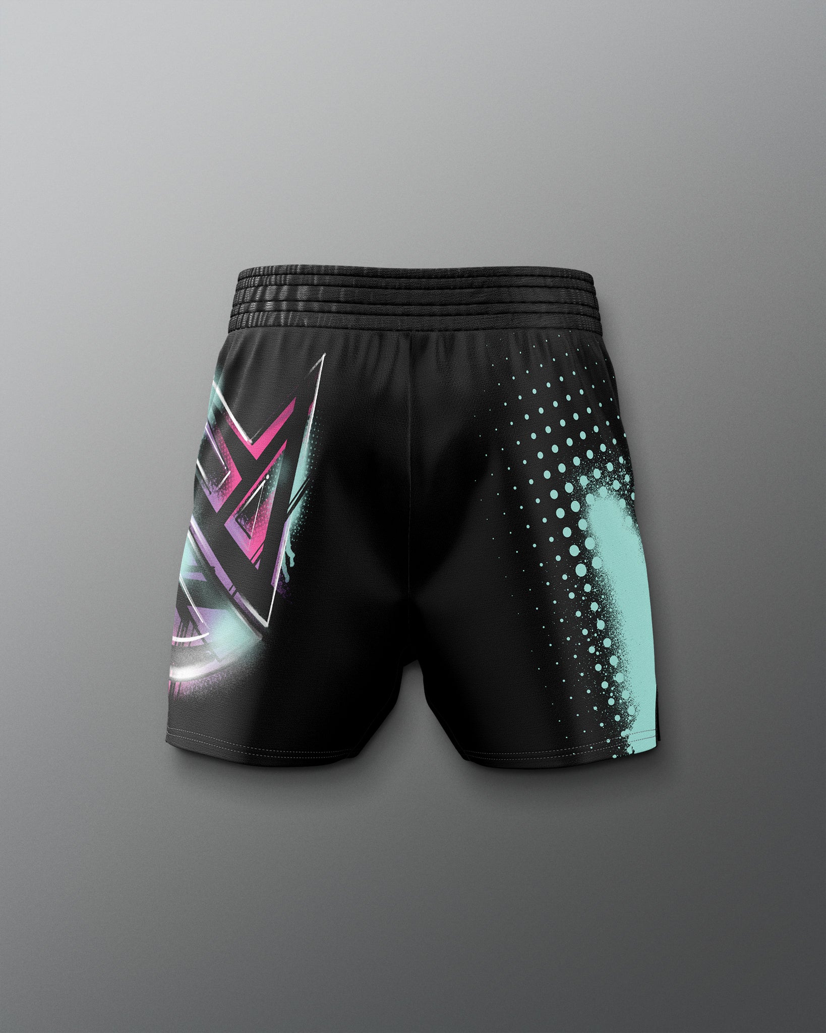Black shorts with colorful geometric pattern on a gray background