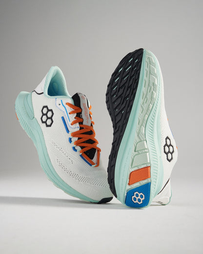 A dynamic pair of modern white athletic shoes with colorful accents and a textured sole for enhanced grip and performance