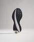 A close-up view of the sole of a running shoe highlighting its intricate tread design and cushioning technology