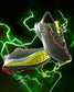 A pair of modern black athletic shoes with vibrant accents featuring a textured sole and a striking green lightning backdrop