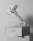 A pair of white KS Infinity Edge Adult Wrestling Shoes placed on a box with a patterned design and the signature of an individual on the box.