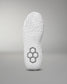 The sole of a white wrestling shoe, set against a soft gray background, showcases a textured design with raised patterns and a prominent gray hexagonal structure for improved grip.