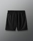 Black shorts on a gray background