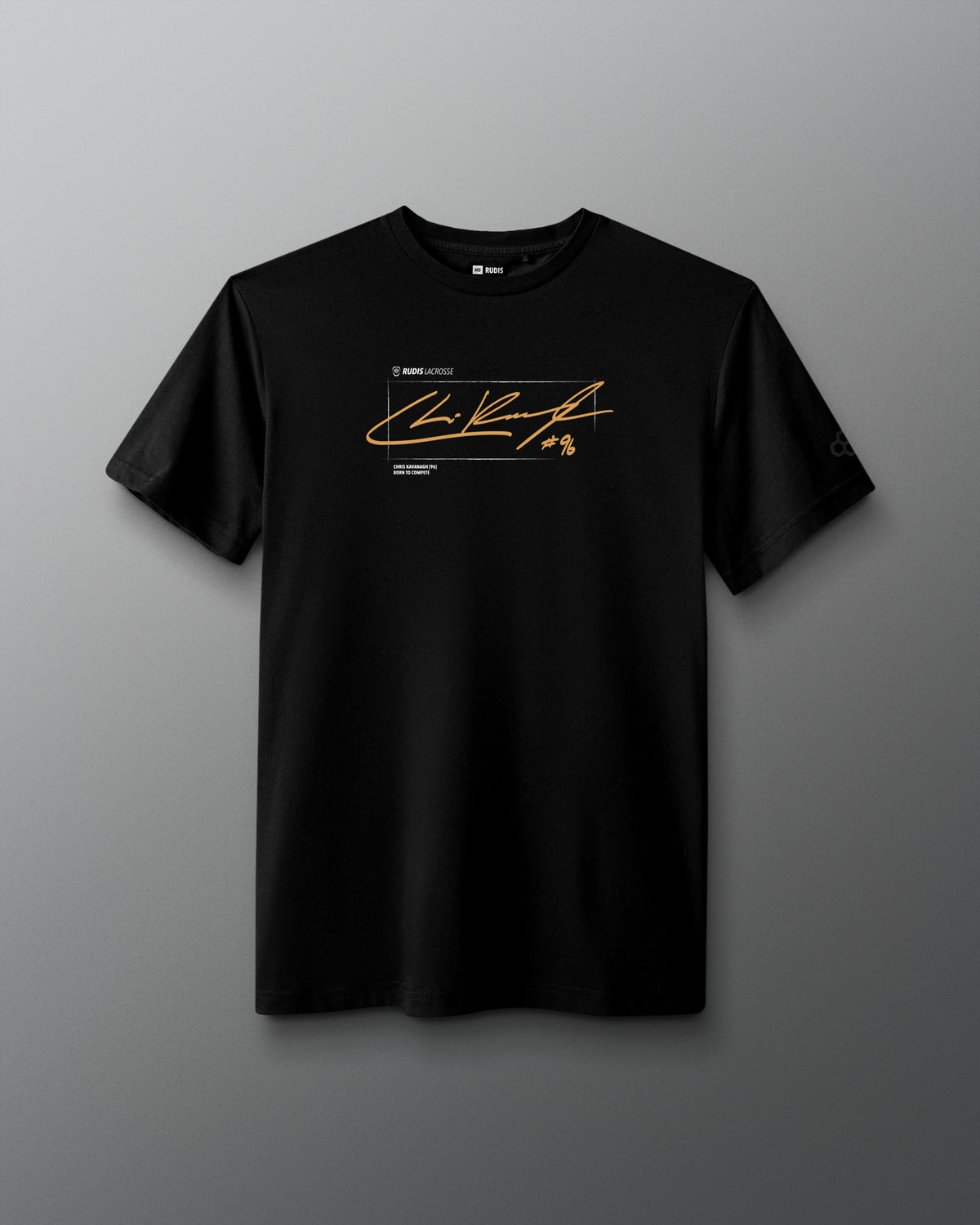 A black short-sleeve crewneck t-shirt featuring a gold signature-style graphic and small text on the chest, displayed against a dark gray gradient background.