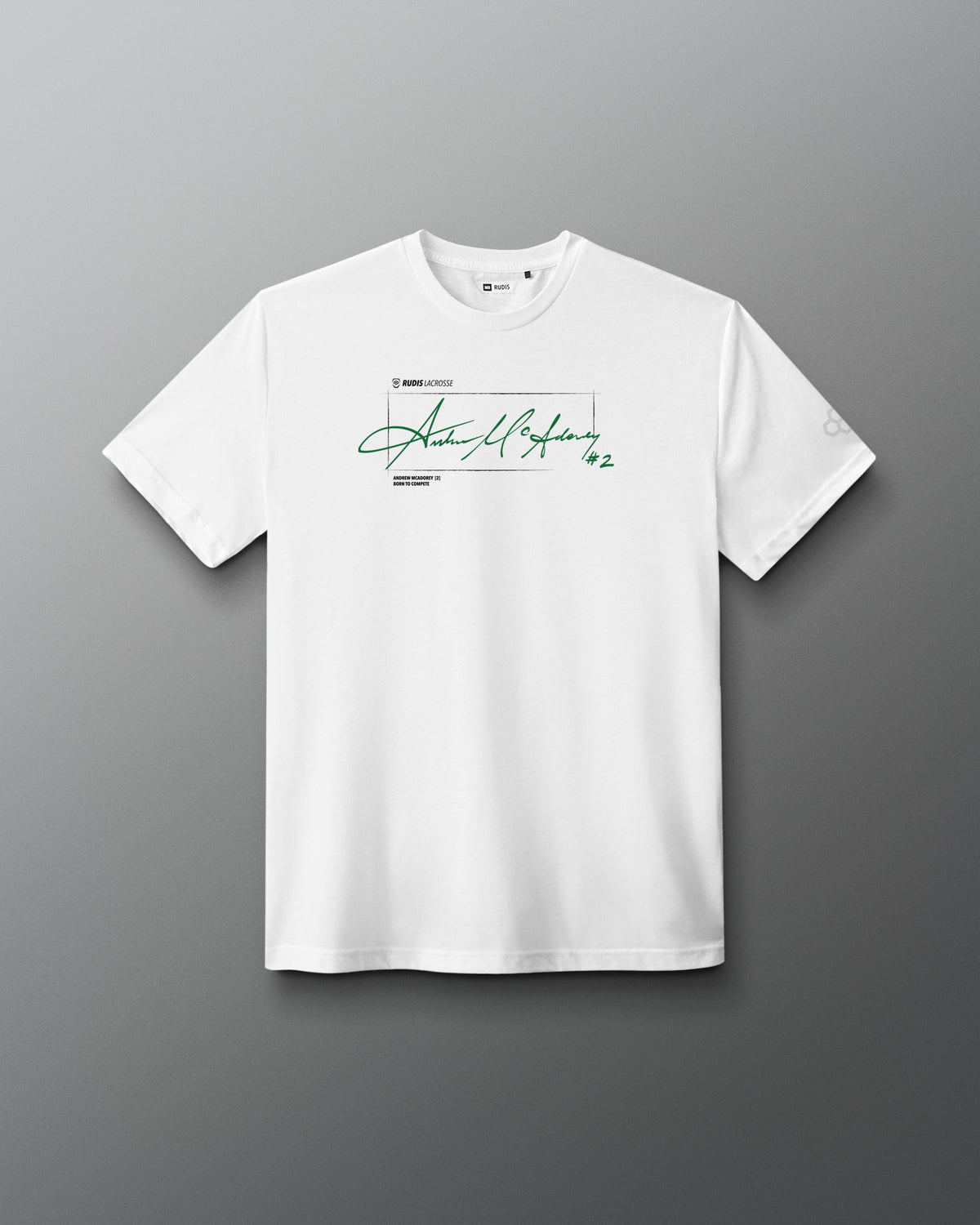 A white short-sleeve crewneck t-shirt featuring a green signature graphic and text on the chest, displayed against a dark gray gradient background.