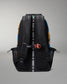 Backpack with visible branding on a gray background