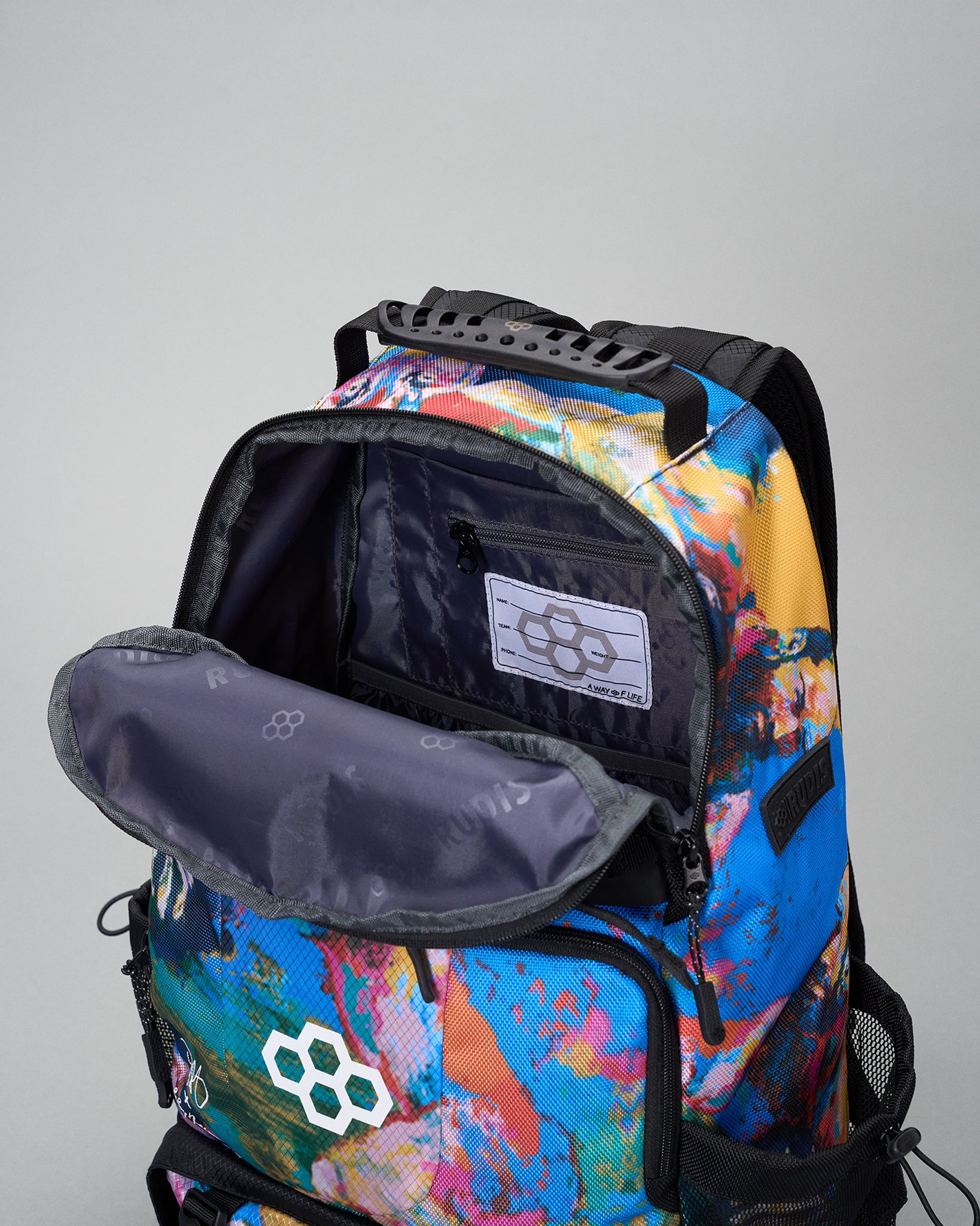 Colorful backpack with a brand logo on a gray background