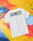 White t-shirt with colorful 'SCHULTZ' logo on a multicolored abstract background