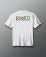 White t-shirt with colorful 'SCHULTZ' logo on the back against a gray background