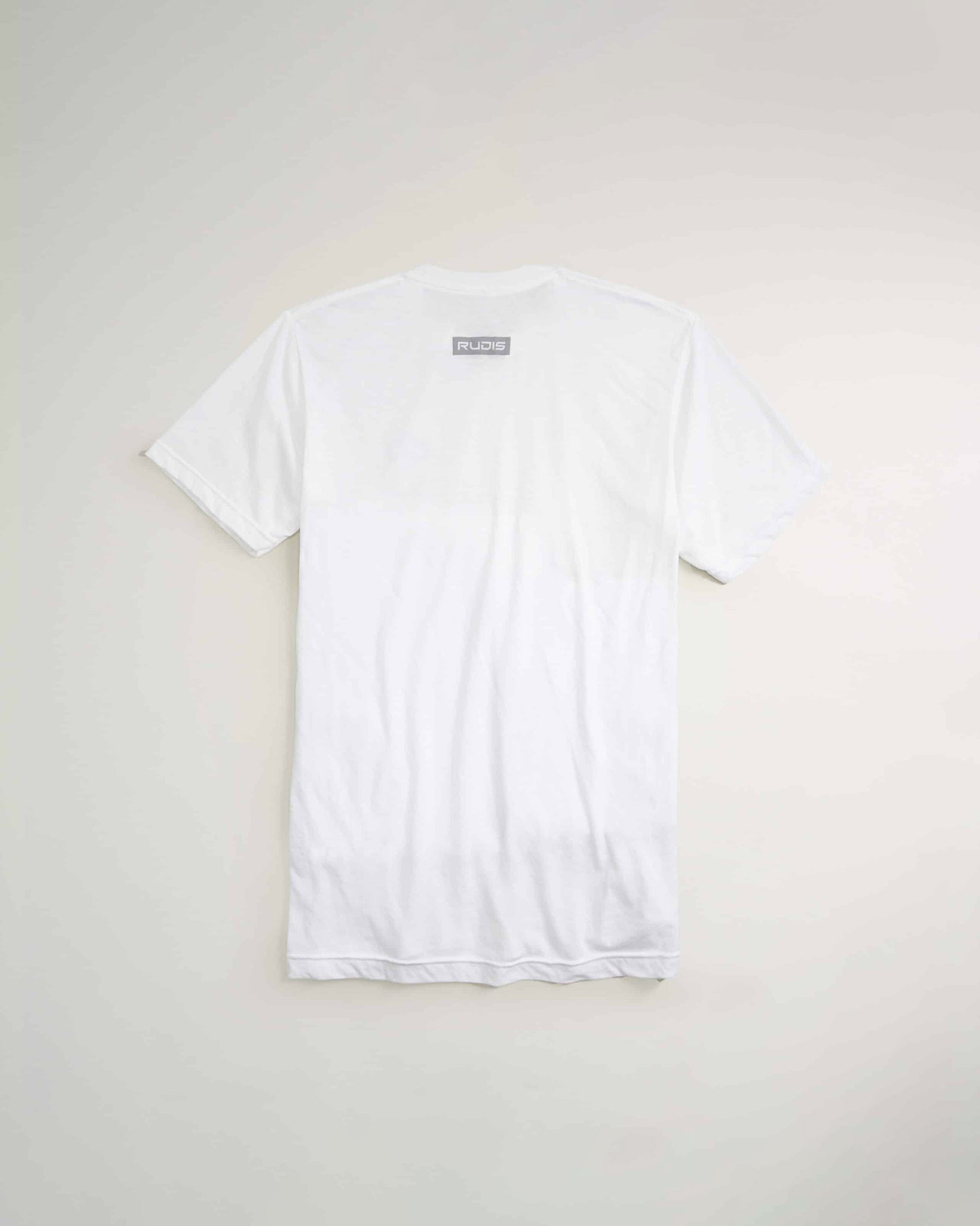 A plain white T-shirt featuring a gray logo at the back neck area presented against a neutral backdrop