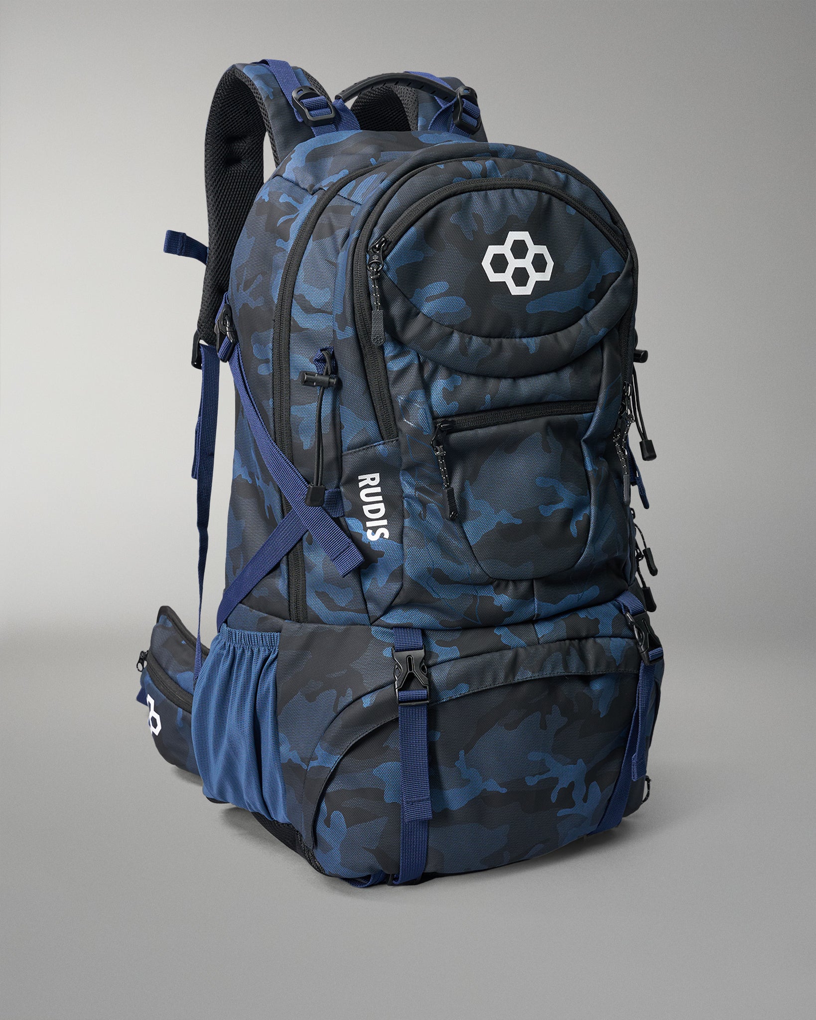 Blue camouflage backpack with visible branding on a gray background