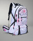 White backpack with black straps and pink accents on a gray background