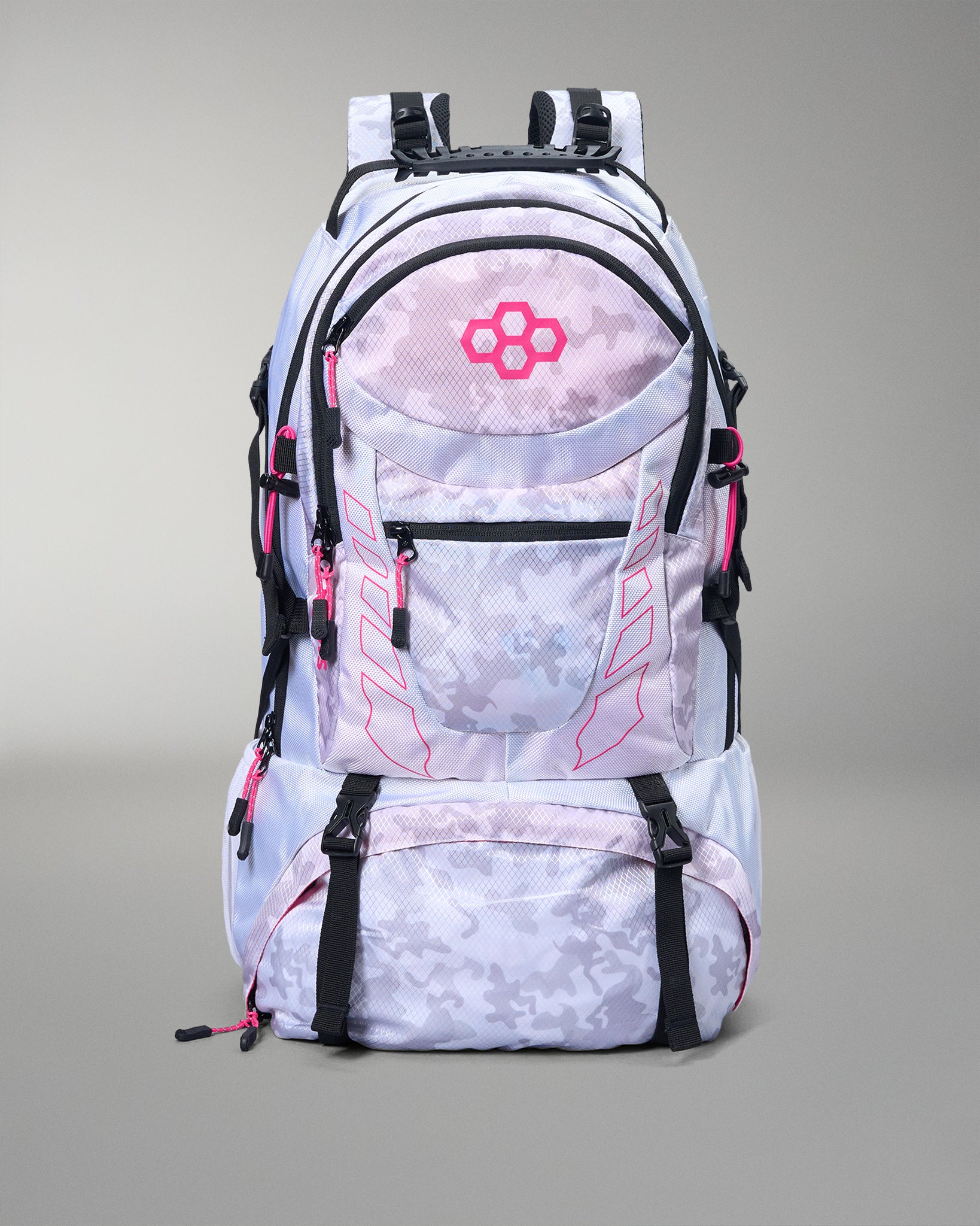 White backpack with pink accents and a logo on a gray background