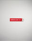 A red keychain tag featuring the word WRESTLING in bold white letters attached to a metal ring against a plain background