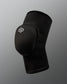 A black wrestling knee pad with a rounded protective cap and logo offers support for athletes, featuring breathable fabric and a minimalist design against a soft gray background.
