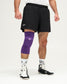 Person wearing a purple knee brace on a white background