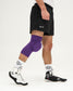 Person wearing a purple knee brace on a white background