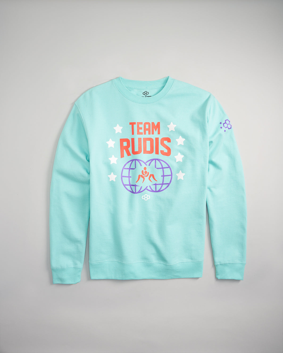 A light teal sweatshirt featuring the text TEAM RUDIS and colorful graphics designed for athletes and fans